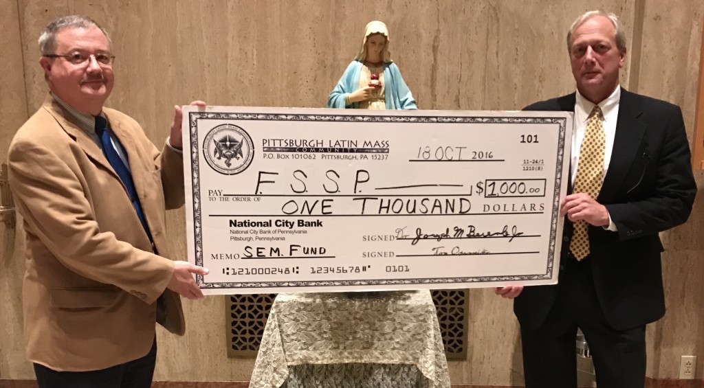 "Big Check" Presentation, P.L.M.C. Chairman, Robert Medvitz, presents the annual seminary fund gift for the benefit of the Fraternity of St. Peter Seminary in the United States.  Mr. Eric Frankovitch graciously received the gift as ad hoc liason between the P.L.M.C. and the Fraternity.  Our annual seminary appeal for the traditional seminaries will occur in December 2016 and all are invited to send a tax deductible donation to this worthy cause.